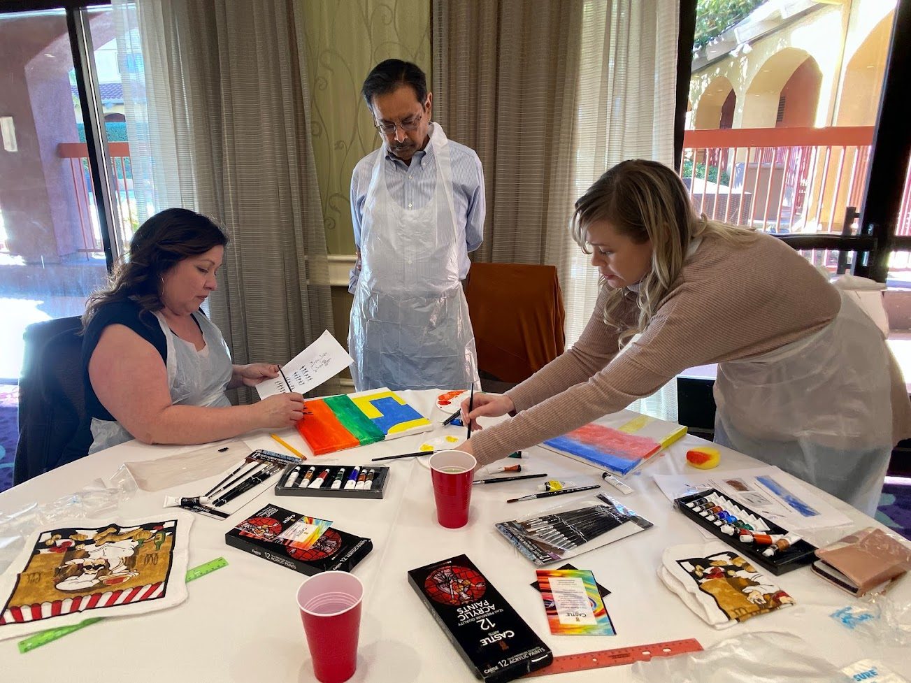 Teammates working on different parts of a shared design